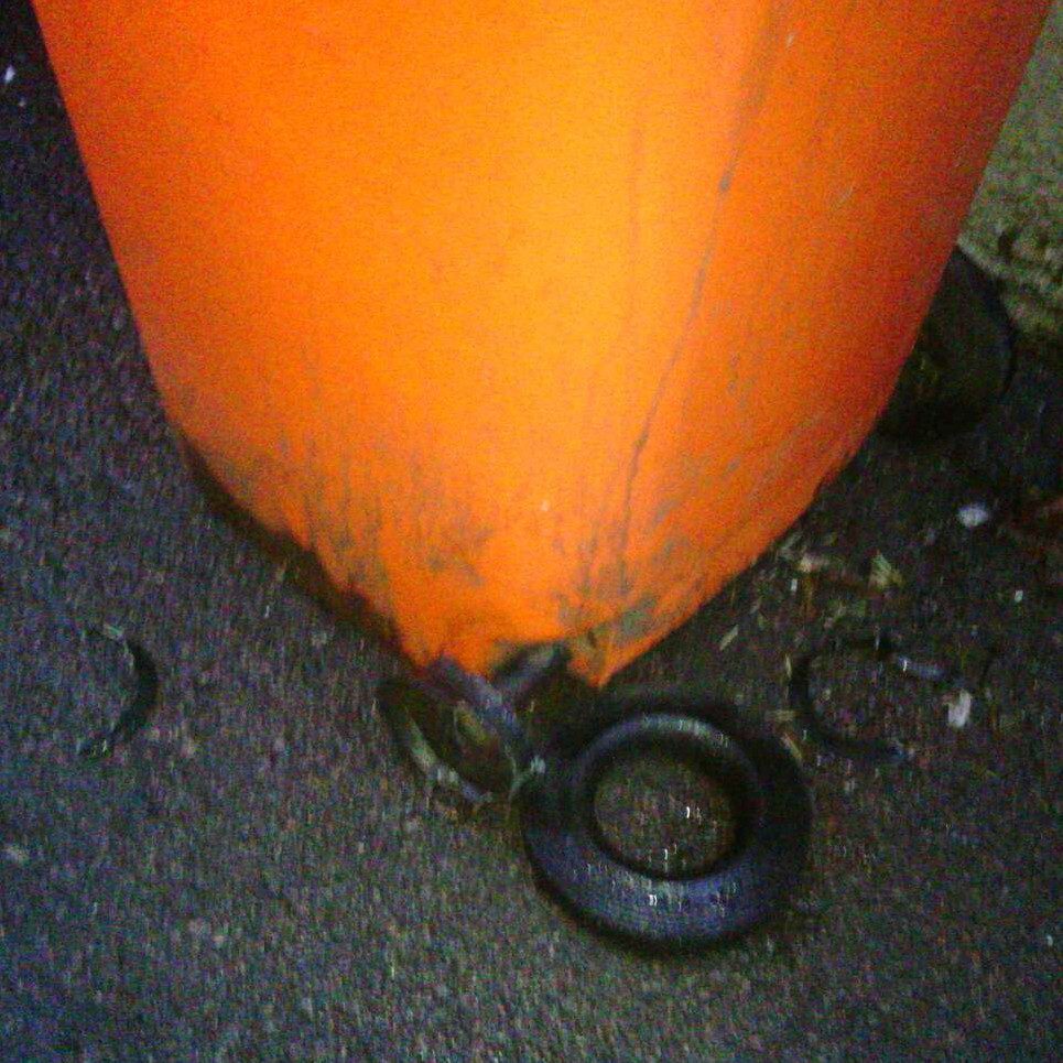 wheelie bin with damaged wheel