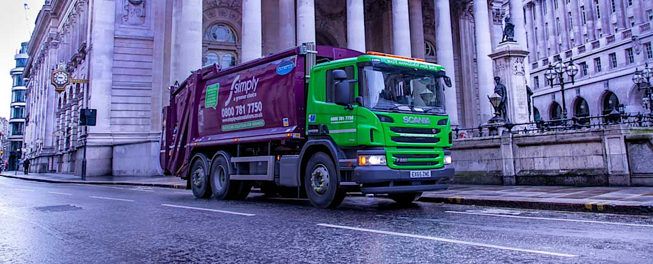 filtered Simply Waste Solutions trade waste truck on road